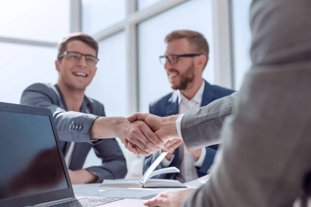 Close up. businessmen confirming the deal with a handshake